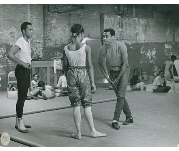 Arthur Mitchell rehearsing early Dance Theatre of Harlem company dancers as children look on, early 1970s. Unknown photographer. Collection Arthur Mitchell Archive, Rare Book & Manuscript Library, Columbia University.