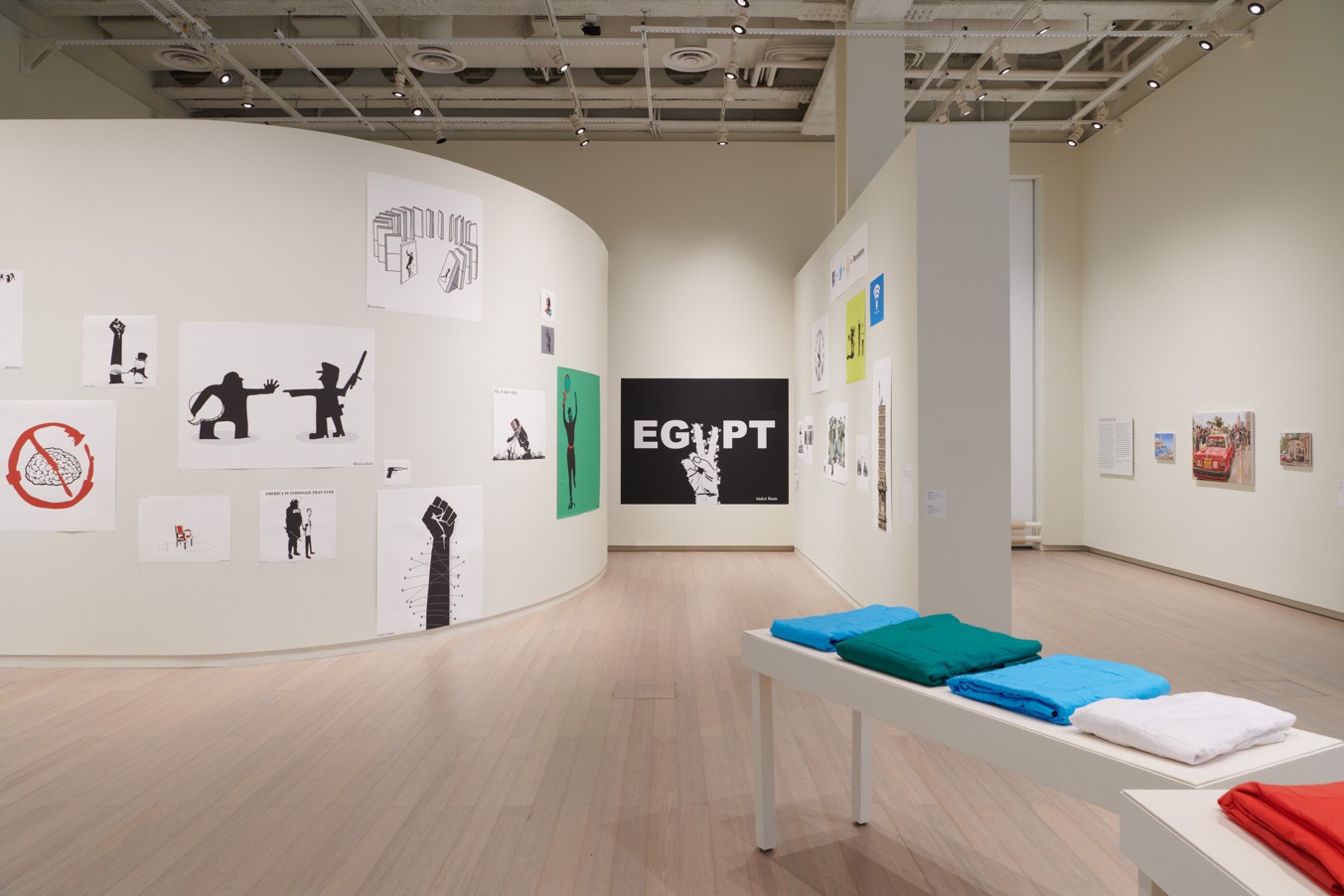 Installation view showing work by the artist Khalid Albaih from the exhibition “The Protest and The Recuperation” on view at the Wallach Art Gallery, Columbia University. Photograph by Kyle Knodell.