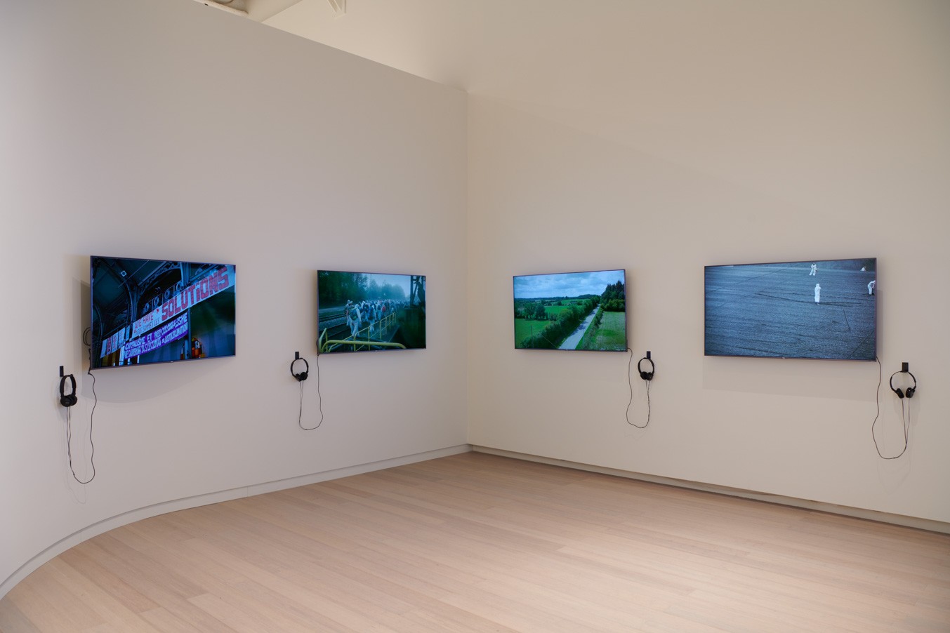 Installation view showing work by the artist Oliver Ressler from the exhibition “The Protest and The Recuperation” on view at the Wallach Art Gallery, Columbia University. Photograph by Kyle Knodell.