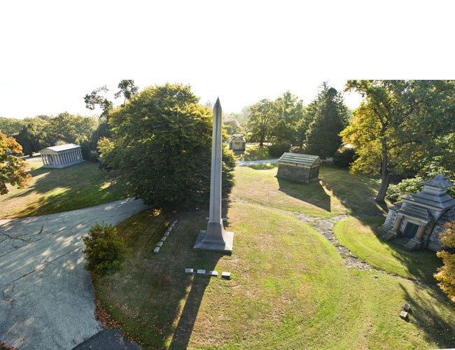 Large circles in Hawthorn and Lakeview Plots with the William Hall obelisk in the foreground and the Jay Gould mausoleum in the distance at left. Gould's is the largest circular lot at Woodlawn. Photograph by Gavin Ashworth.