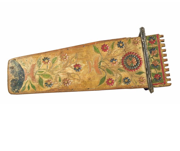 Unknown Kanienʼkehá꞉ka (Mohawk). Cradleboard with flower designs, Mid-19th century. Wood, carved and painted. Avery Architectural & Fine Arts Library, Collection of Art Properties; gift of Stanley B. and Caroline Stein.