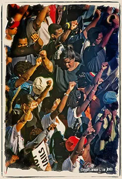 Carmen L. de Jesús, "Together We Rise One Fist Out of Many," 1998. Chromogenic print on paper. 22 × 17 in.