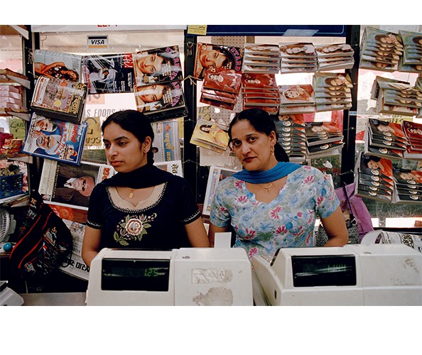 Gauri Gill, Indian grocery store in Queens, New York 2004 from The Americans, 2000-2007. Archival pigment print, 27 x 40 in. Gauri Gill, Indian grocery store in Queens, New York 2004 from The Americans, 2000-2007. Archival pigment print, 27 x 40 in.