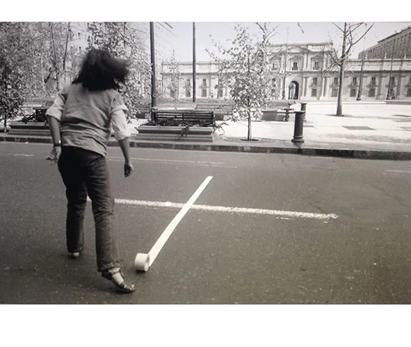 Detail of Lotty Rosenfeld, Una Milla de Cruces Sobre el Pavimento [One Mile of Crosses on the Pavement], 1979. Art action in front of the Moneda Palace, Santiago de Chile, 1979. Courtesy the Lotty Rosenfeld Foundation.
