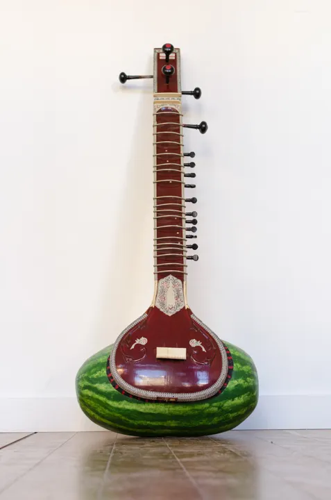 Michael Kelly Williams, "Samta," 2017. Cinefoil, paint, painted fiberglass watermelon, sitar composed of wood, plastic, rubber, metal, and cardboard. 50 × 19 × 12 in.