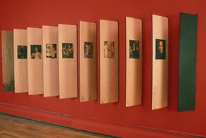 Tomie Arai, installation photograph of "Stories from La Colonia China," 2003. Wood, silkscreen, and metal hinges. 4 x 15 feet, dimensions variable.