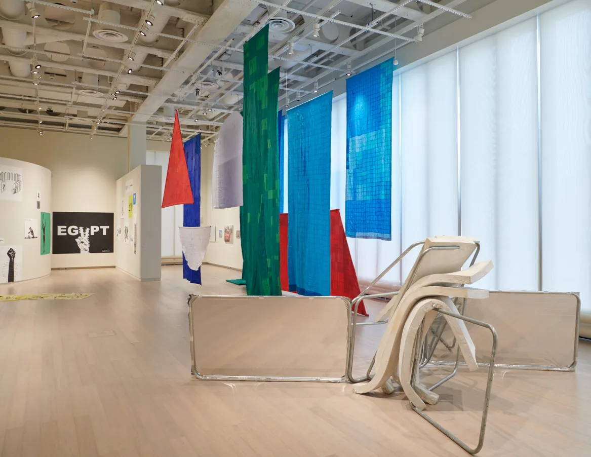 Installation view showing works by the artists Sreshta Rit Premnath and Sharon Chin from the exhibition “The Protest and The Recuperation” on view at the Wallach Art Gallery, Columbia University. Photograph by Kyle Knodell.
