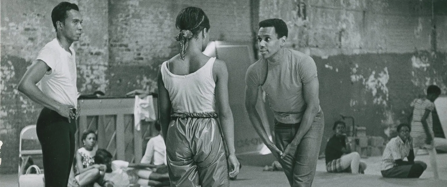 Arthur Mitchell rehearsing early Dance Theatre of Harlem company dancers as children look on, early 1970s. Unknown photographer. Arthur Mitchell Collection, Rare Book & Manuscript Library, Columbia University.