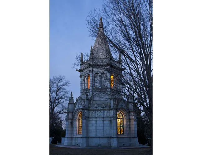 A view of Harbeck mausoleum illuminated at night. Photograph by Gavin Ashworth.